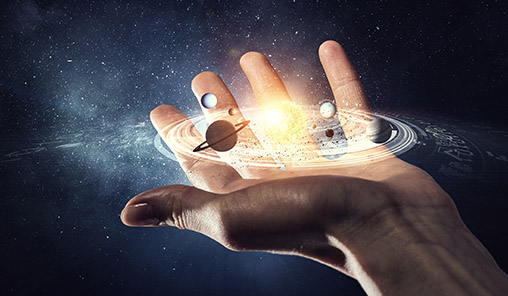 Planets orbiting within the palm of a human hand